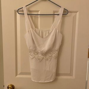 White sleeveless top
